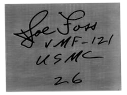 Scanned handwritten message and signature on dark paper as received